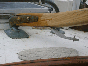 New tiller-scrapemat