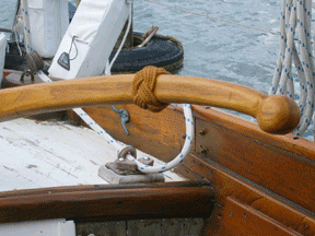 Tiller carved